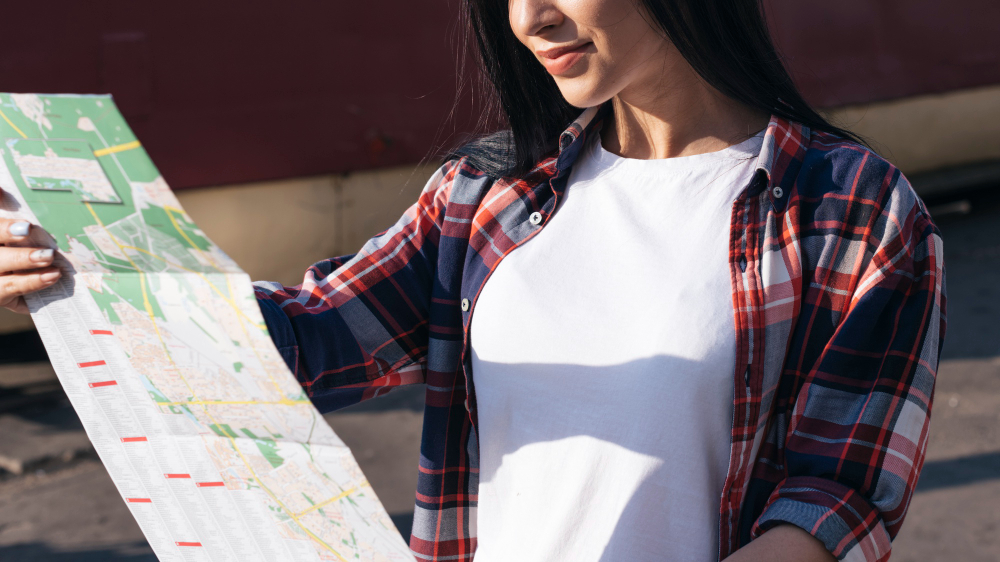 person looking at map
