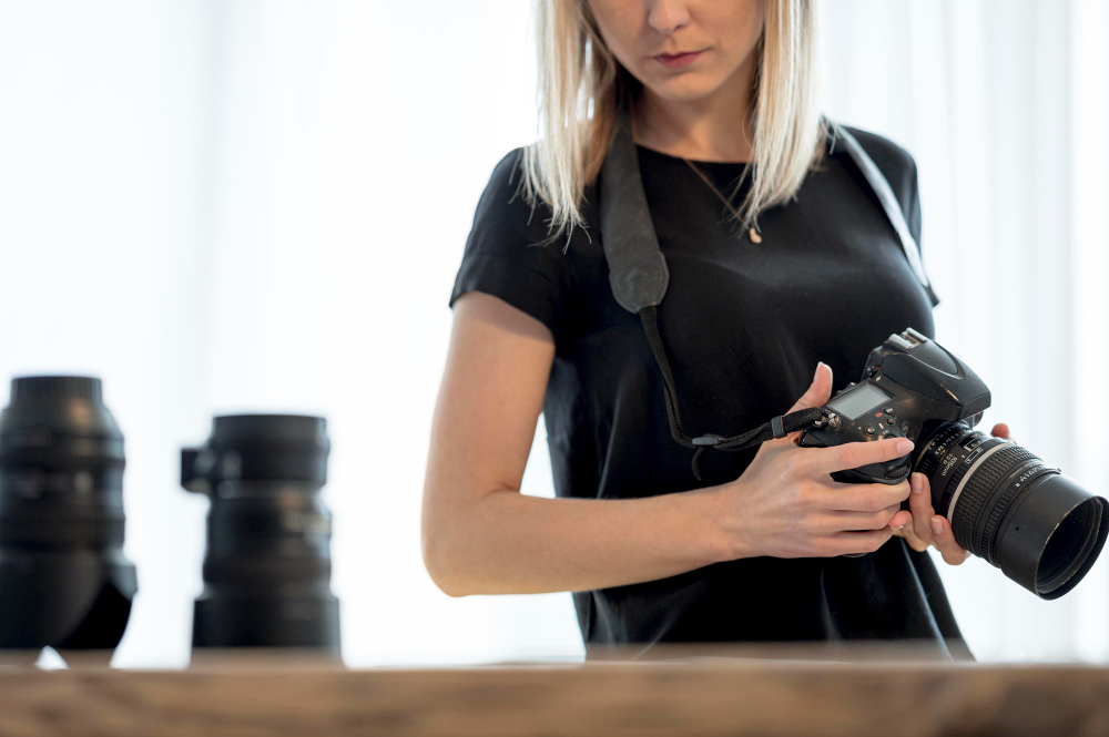 person with camera gear